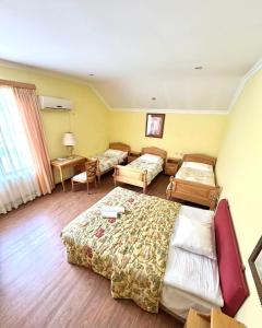 Letto o letti in una camera di Hotel Lileo