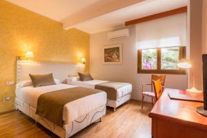 Кровать или кровати в номере BYPILLOW California