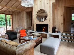 Posezení v ubytování Magnifique maison à 20 m de la mer vue bassin