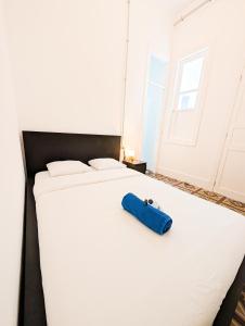 Postel nebo postele na pokoji v ubytování Las Palmas Nest Hostel