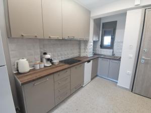 Kuchyňa alebo kuchynka v ubytovaní JeSea Home