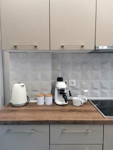 Kuchyňa alebo kuchynka v ubytovaní JeSea Home