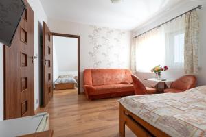Postel nebo postele na pokoji v ubytování Dom Gościnny "Berberys"