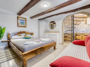 Posteľ alebo postele v izbe v ubytovaní Holiday Home Lovreno by Interhome