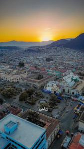 an aerial view of a city at sunset at Apartamento Luna Bella in Chitay