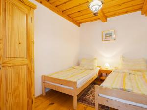 Postel nebo postele na pokoji v ubytování Holiday Home Szijartó by Interhome + 14 fotografií