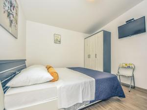 Postel nebo postele na pokoji v ubytování Holiday Home Jolumar by Interhome