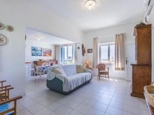 Katil atau katil-katil dalam bilik di Holiday Home Harbour by Interhome