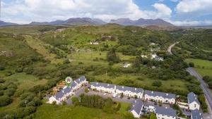 an aerial view of a house in the mountains at Cuirt Haven Clifden in Clifden