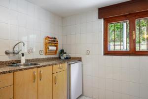 Kuchyň nebo kuchyňský kout v ubytování Casita en el Puerto