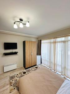 Fotografie z fotogalerie ubytování Отель Асман v destinaci Bosteri + 28 fotografií