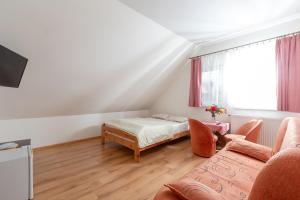 Postel nebo postele na pokoji v ubytování Dom Gościnny "Berberys"