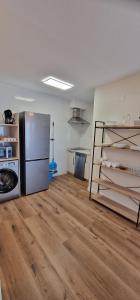 Kuchyň nebo kuchyňský kout v ubytování Apartamentos Suaces