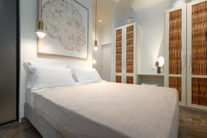Postel nebo postele na pokoji v ubytování Hotel Oasis