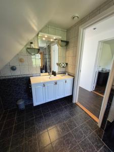 Kuchyň nebo kuchyňský kout v ubytování White Cat Guesthouse