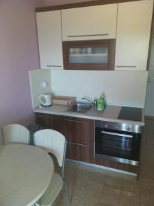 Kuchyň nebo kuchyňský kout v ubytování Apartment Bay of Dreams