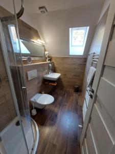 Koupelna v ubytování Hotel SEVERKA + 37 fotografií