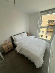 Кровать или кровати в номере London Bliss Apartment Retreat