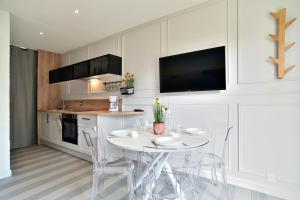 Kuchyň nebo kuchyňský kout v ubytování Lya 04 - 5min à Pied de la Plage