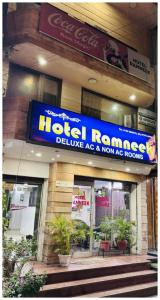 a hotel resonance sign on the front of a building at Amritsar Hotel R-A-M-N-E-E-K Near Bus Stand - Spacious Rooms With Free Wi-fi - Restaurant# Parking & Excellent Customer Service - Best Location In Amritsar in Amritsar +16 photos