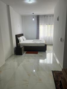 Ένα ή περισσότερα κρεβάτια σε δωμάτιο στο Residence Alpha +6 φωτογραφίες