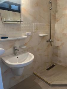 Ένα μπάνιο στο Residence Alpha