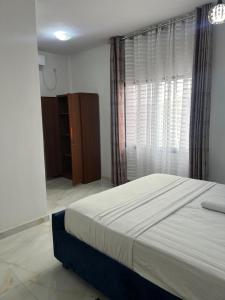 Ένα ή περισσότερα κρεβάτια σε δωμάτιο στο Residence Alpha