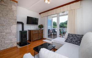 TV a/nebo společenská místnost v ubytování Apartment Medulin Krase Ii