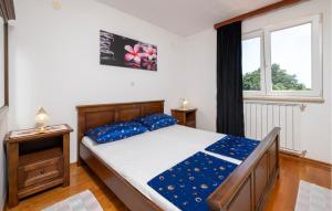 Postel nebo postele na pokoji v ubytování Apartment Medulin Krase Ii