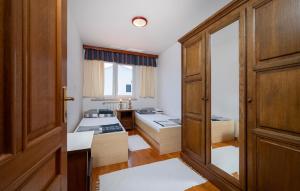 Postel nebo postele na pokoji v ubytování Apartment Medulin Krase Ii