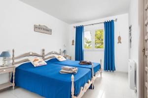 En eller flere senge i et værelse på Apartamento en Alta Mar + 20 billeder