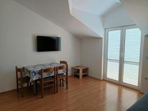 TV/trung tâm giải trí tại Apartmani Danica