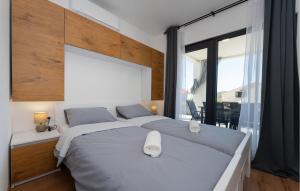 Voodi või voodid majutusasutuse Cozy Home In Posedarje toas