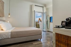 Postel nebo postele na pokoji v ubytování Hotel Oasis + 37 fotografií