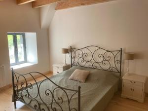 Postel nebo postele na pokoji v ubytování Gîte du Redondet