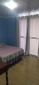 Ένα ή περισσότερα κρεβάτια σε δωμάτιο στο Apartamento residencial inteiro
