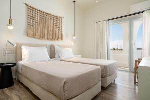 Postel nebo postele na pokoji v ubytování Hotel Oasis