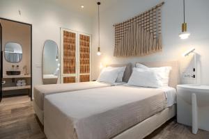 Postel nebo postele na pokoji v ubytování Hotel Oasis