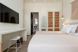 Postel nebo postele na pokoji v ubytování Hotel Oasis