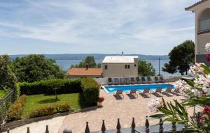 a villa with a pool and a view at Ten-Bedroom Holiday Home In Duce in Tice +51 photos