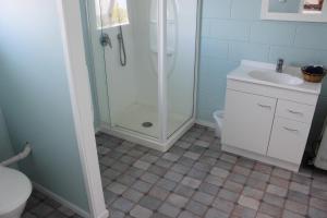Ванная комната в Mangonui Motel