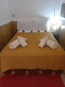 Postel nebo postele na pokoji v ubytování Riad Dar Lilas