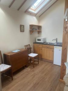 Køkken eller tekøkken på Holly cottage