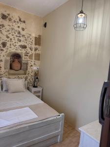 Posteľ alebo postele v izbe v ubytovaní Villa Styliani