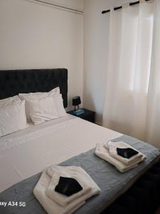 Ένα ή περισσότερα κρεβάτια σε δωμάτιο στο Constantina D Apt Argos