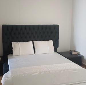 Ένα ή περισσότερα κρεβάτια σε δωμάτιο στο Constantina D Apt Argos