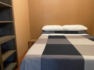 Giường trong phòng chung tại Il piccolo Loft