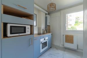 Köök või kööginurk majutusasutuses Appartement face Nausicaa , balcon vue mer