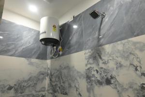 Μια τηλεόραση ή/και κέντρο ψυχαγωγίας στο Shree Hari Niwas P Guest House +16 φωτογραφίες