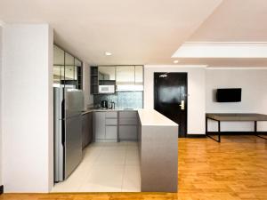 Kuchyň nebo kuchyňský kout v ubytování Rembrandt Residences Bangkok